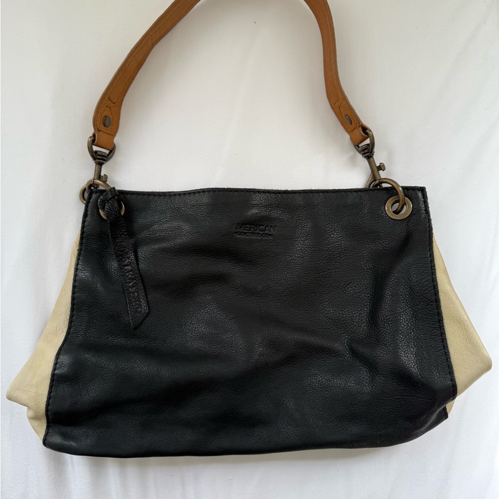 Chic Black and Tan Shoulder Bag with Adjustable Strap